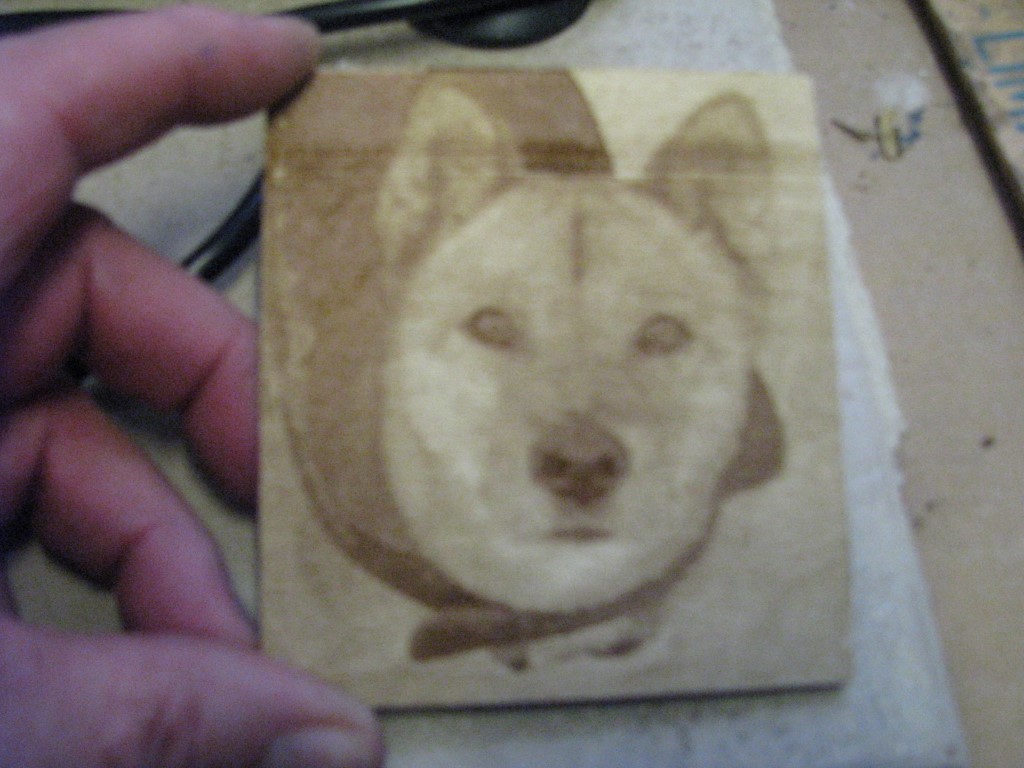 Raster engrave on wood.  I can do better, this was a quick test.  This is from photo of Sunshine.