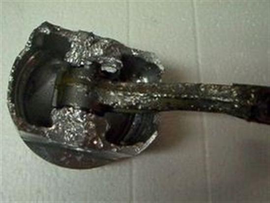 Bent rod from exploded engine
